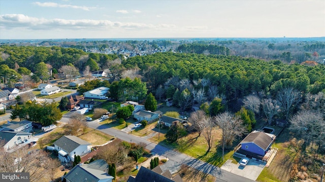 12524 Salisbury Rd, Ocean City, MD 21842 - drone / aerial view featuring a residential view and a wooded view