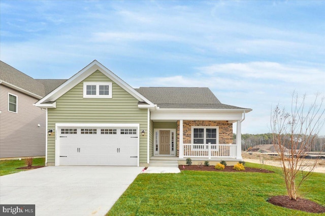12524 Salisbury Rd, Ocean City, MD 21842 - craftsman inspired home featuring concrete driveway, an attached garage, a porch, a front yard, and roof with shingles