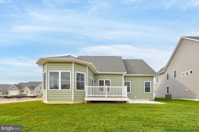 12524 Salisbury Rd, Ocean City, MD 21842 - back of house with central air condition unit, a yard, a patio area, and a deck