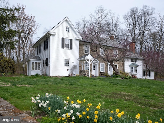 3837 Curly Hill Rd, Doylestown, PA 18902 - view of front of home with a chimney and a front lawn
