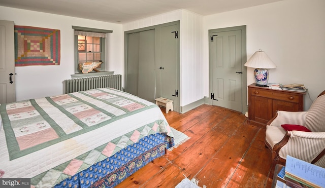 3837 Curly Hill Rd, Doylestown, PA 18902 - bedroom featuring radiator, a closet, and wood-type flooring