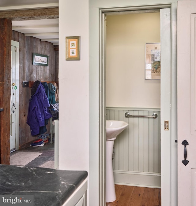 3837 Curly Hill Rd, Doylestown, PA 18902 - bathroom featuring a wainscoted wall, wood walls, wood finished floors, and beam ceiling