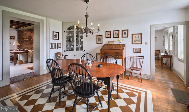 3837 Curly Hill Rd, Doylestown, PA 18902 - dining space featuring a notable chandelier and light wood-type flooring