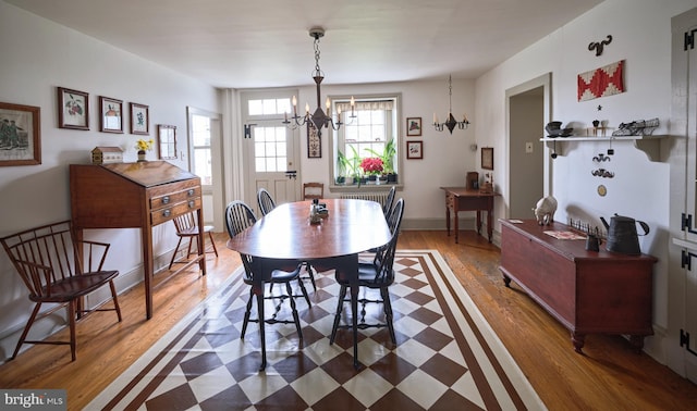 3837 Curly Hill Rd, Doylestown, PA 18902 - dining area featuring a chandelier and wood finished floors