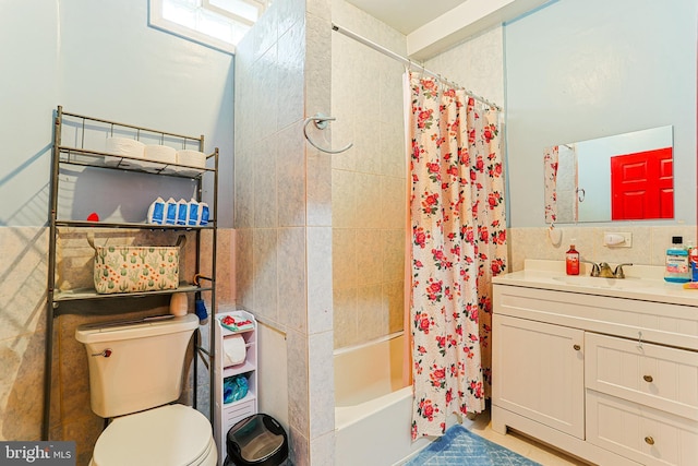 3903 N Marshall St, Philadelphia, PA 19140 - bathroom with toilet, vanity, shower / bath combination with curtain, and tile walls
