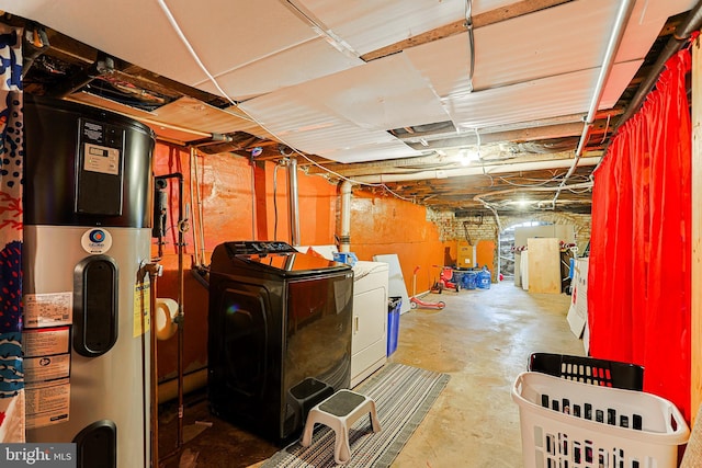 3903 N Marshall St, Philadelphia, PA 19140 - unfinished below grade area featuring washing machine and clothes dryer and hybrid water heater