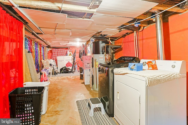 3903 N Marshall St, Philadelphia, PA 19140 - unfinished basement featuring water heater and washer and clothes dryer