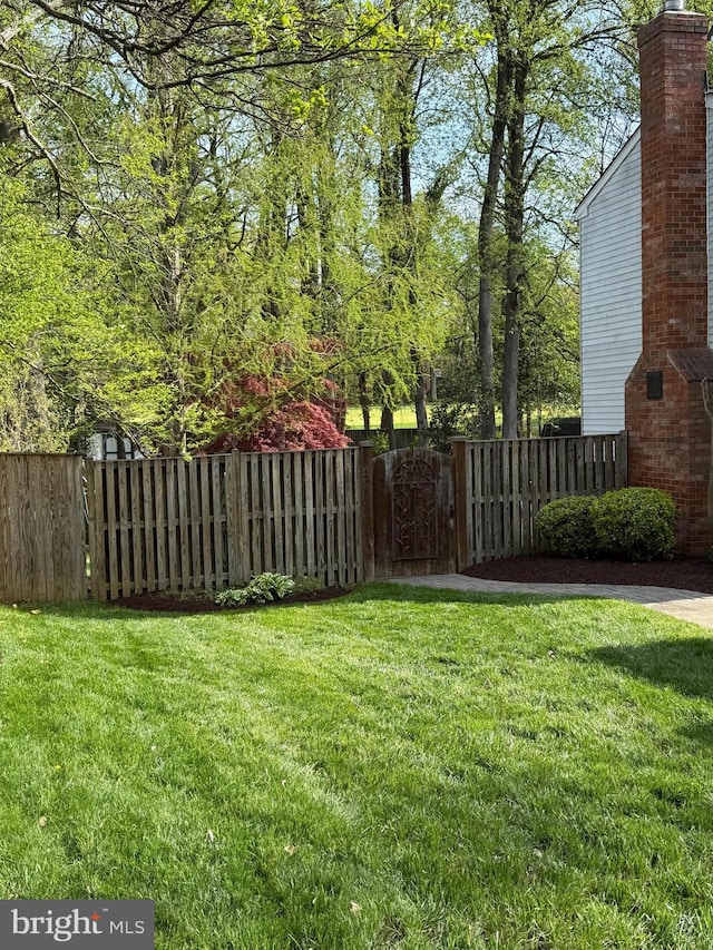 view of yard with fence