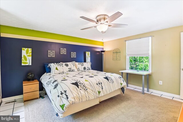 bedroom with baseboards and a ceiling fan