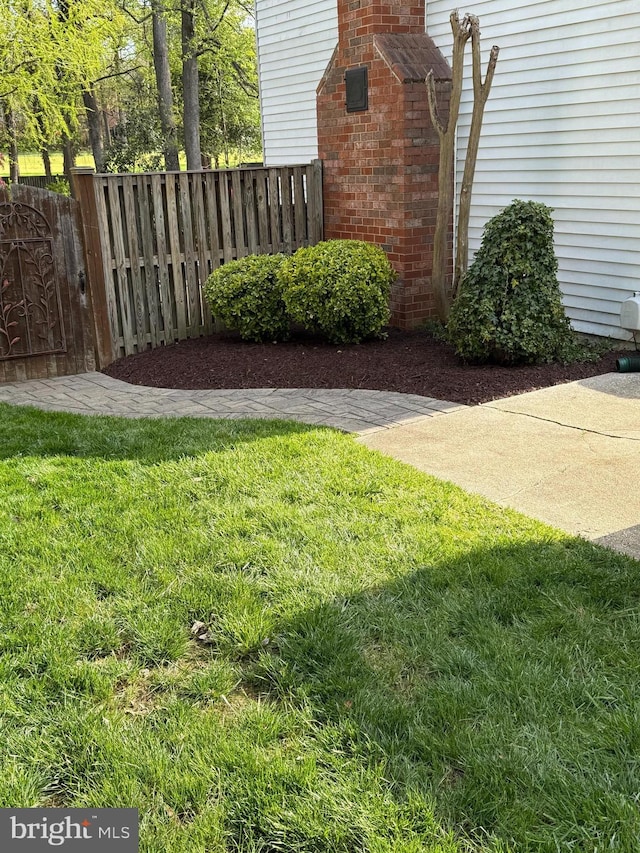view of yard featuring fence