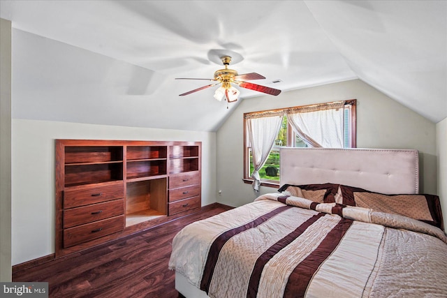 bedroom with dark wood-style flooring, baseboards, a ceiling fan, and lofted ceiling