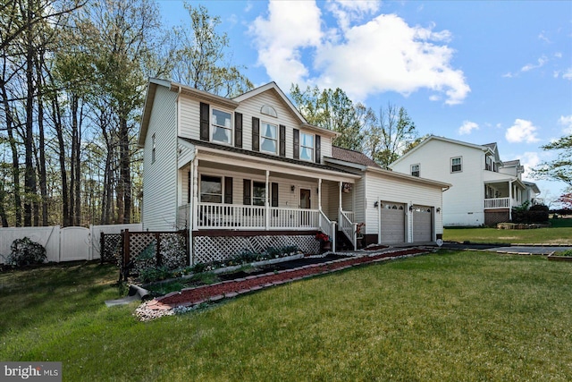 view of front of house with an attached garage, covered porch, fence, and a front lawn