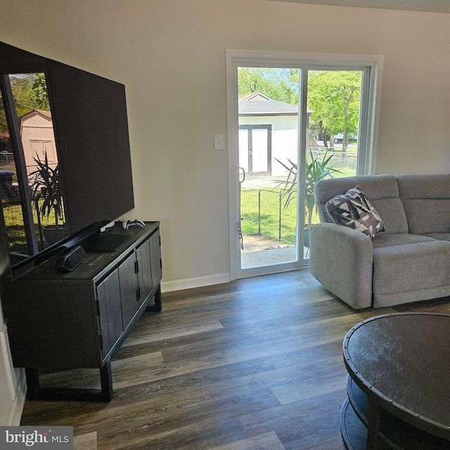 110 Harwich St, Browns Mills, NJ 08015 - living area with dark wood-style floors and baseboards