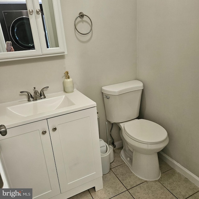 110 Harwich St, Browns Mills, NJ 08015 - half bathroom with tile patterned flooring, toilet, vanity, and baseboards