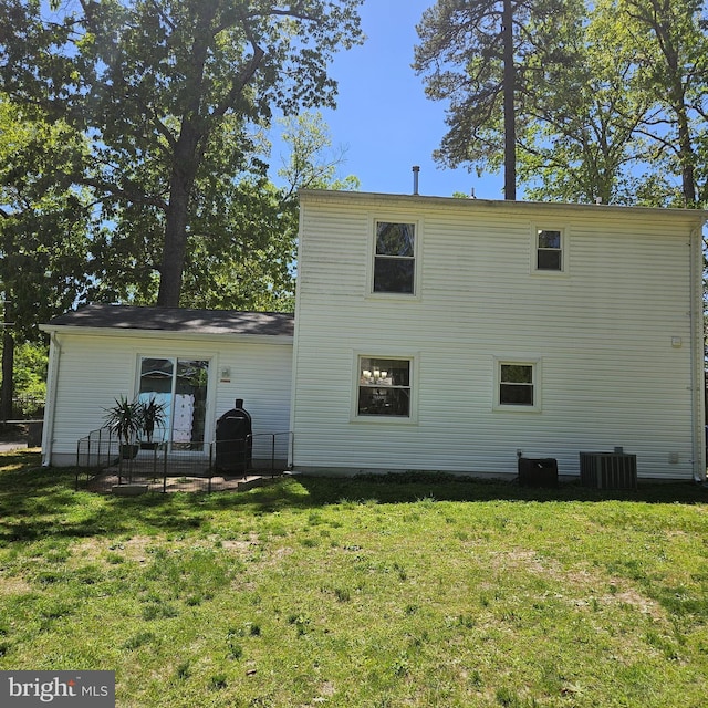 110 Harwich St, Browns Mills, NJ 08015 - back of property with a yard and central air condition unit