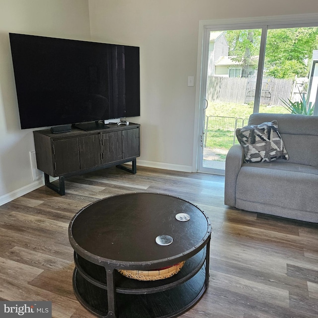 110 Harwich St, Browns Mills, NJ 08015 - living area featuring baseboards, healthy amount of natural light, and wood finished floors