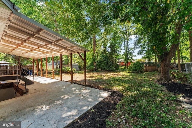 view of yard with a fenced backyard and a patio area