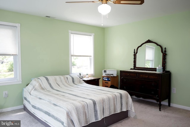 360 Haverford Ave, Wenonah, NJ 08090 - carpeted bedroom with baseboards, ceiling fan, and multiple windows