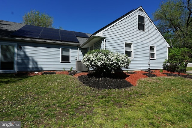 360 Haverford Ave, Wenonah, NJ 08090 - back of house with a lawn, roof mounted solar panels, and central AC