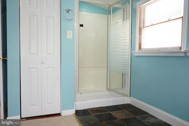 360 Haverford Ave, Wenonah, NJ 08090 - full bath with baseboards, stone finish flooring, a stall shower, and a closet