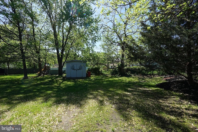 360 Haverford Ave, Wenonah, NJ 08090 - view of yard with a storage unit, fence, and an outbuilding