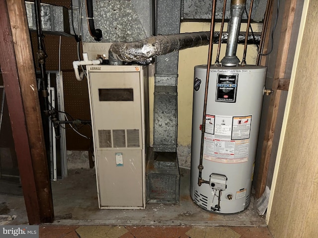 utility room with gas water heater
