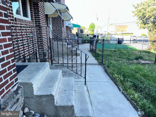 view of patio / terrace featuring fence