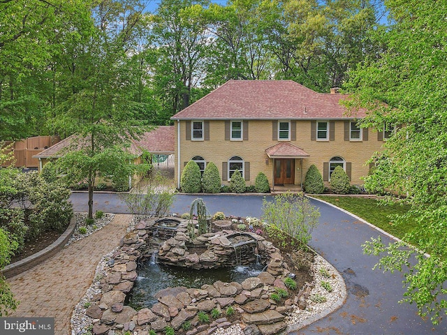 400 Highview Dr, Wayne, PA 19087 - colonial home with a garden pond and driveway