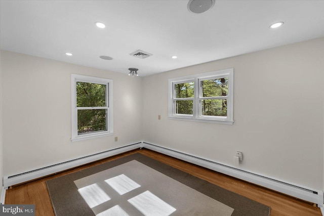 400 Highview Dr, Wayne, PA 19087 - unfurnished room with baseboard heating, wood finished floors, a baseboard heating unit, and recessed lighting