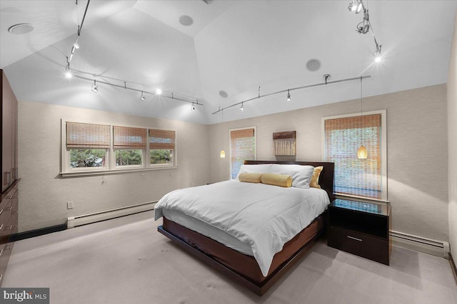 400 Highview Dr, Wayne, PA 19087 - bedroom with baseboard heating, rail lighting, and vaulted ceiling