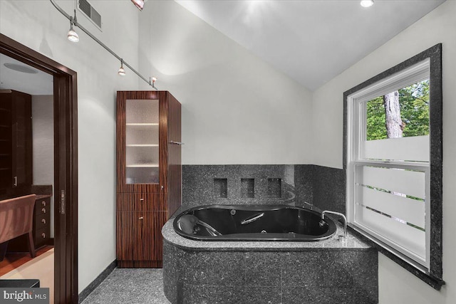 400 Highview Dr, Wayne, PA 19087 - full bathroom featuring a whirlpool tub, lofted ceiling, and baseboards
