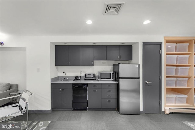 400 Highview Dr, Wayne, PA 19087 - kitchen with appliances with stainless steel finishes, a sink, a baseboard radiator, recessed lighting, and light countertops
