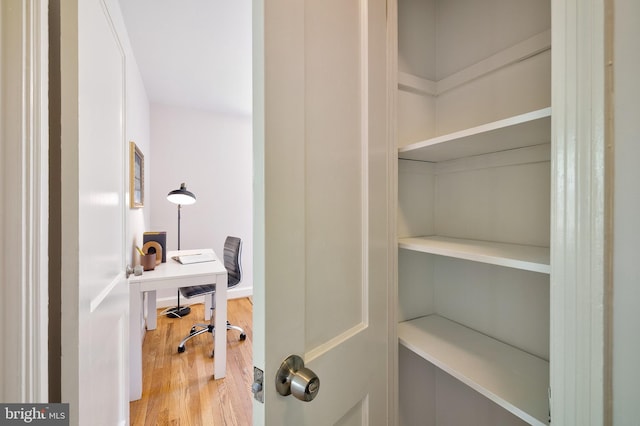 office space with light wood-type flooring