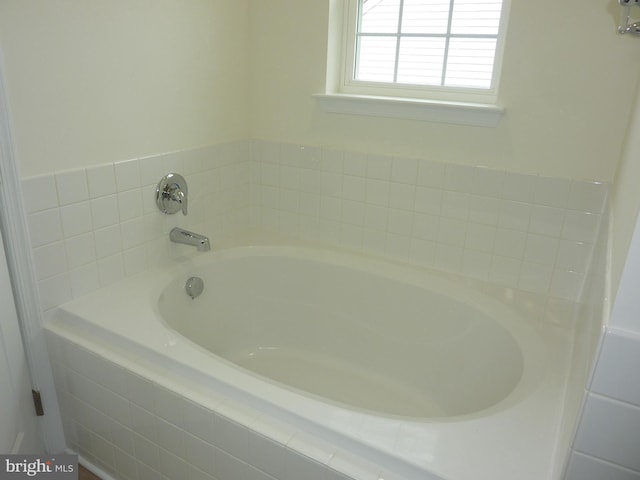 full bathroom with a bath
