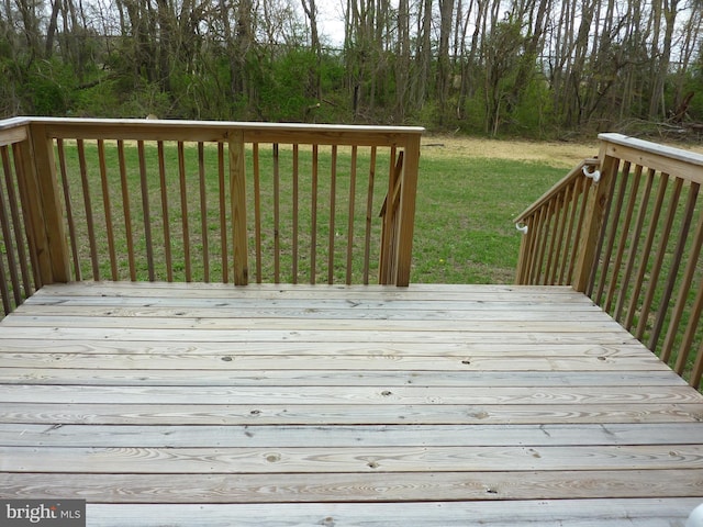 deck featuring a yard
