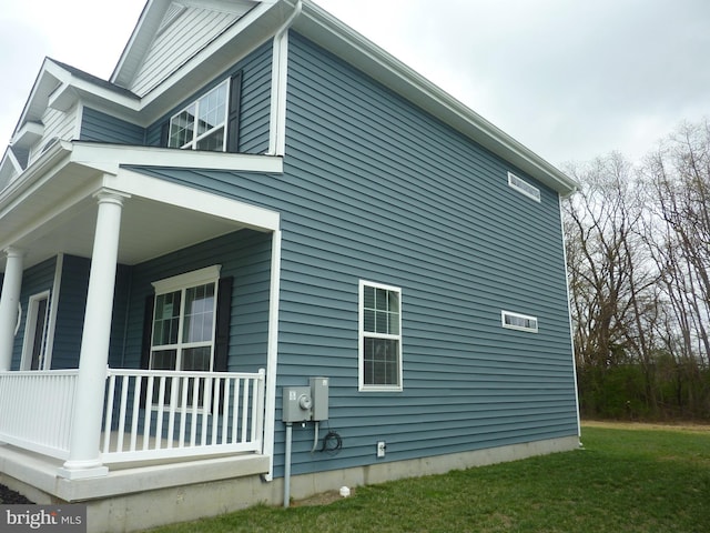 view of home's exterior with covered porch