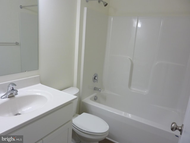 full bathroom with toilet, vanity, and shower / bathing tub combination