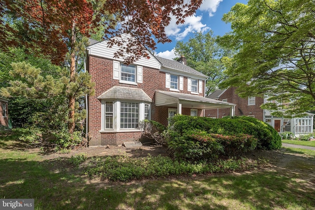 7411 Elizabeth Rd, Elkins Park, PA 19027 - traditional home with brick siding and a chimney