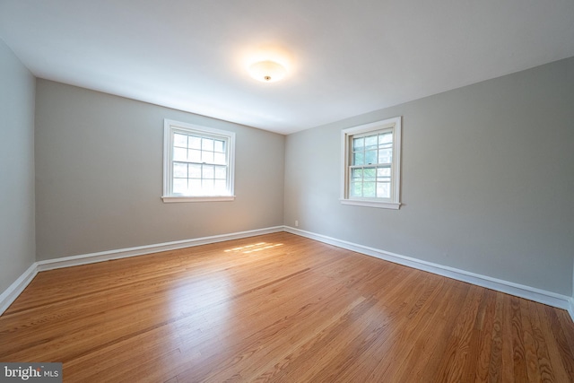 7411 Elizabeth Rd, Elkins Park, PA 19027 - spare room with plenty of natural light, wood finished floors, and baseboards