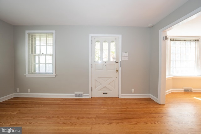 7411 Elizabeth Rd, Elkins Park, PA 19027 - entryway with light wood-style floors and baseboards