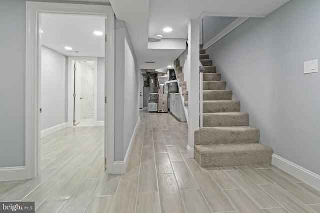 300 Denison St, Baltimore, MD 21229 - entryway with stairway, baseboards, and wood tiled floor