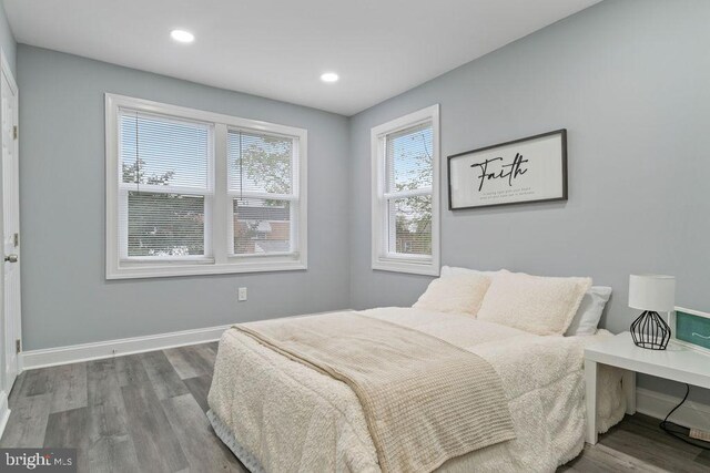 300 Denison St, Baltimore, MD 21229 - bedroom with wood finished floors, baseboards, and recessed lighting