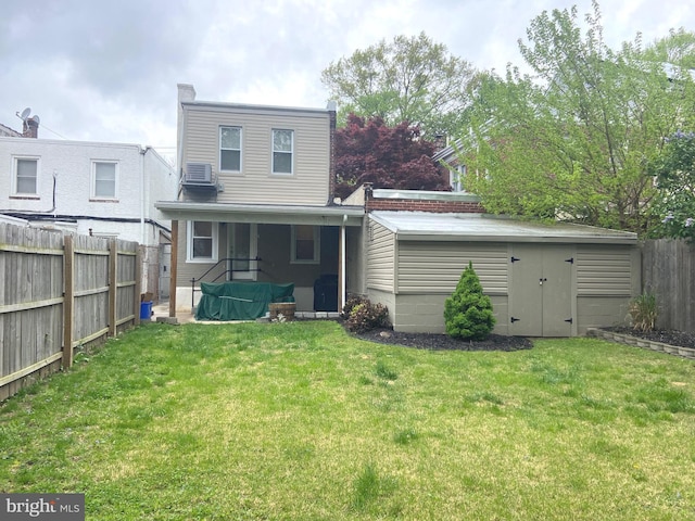 rear view of property featuring a sunroom