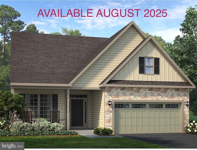 610 Greenbriar Path, Cochranville, PA 19330 - view of front of home with board and batten siding, stone siding, roof with shingles, and asphalt driveway