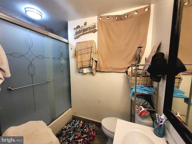 3149 Jasper St, Philadelphia, PA 19134 - bathroom featuring an enclosed shower, toilet, and baseboards