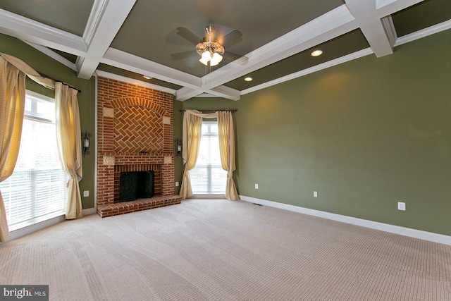 unfurnished living room with baseboards, beamed ceiling, and coffered ceiling