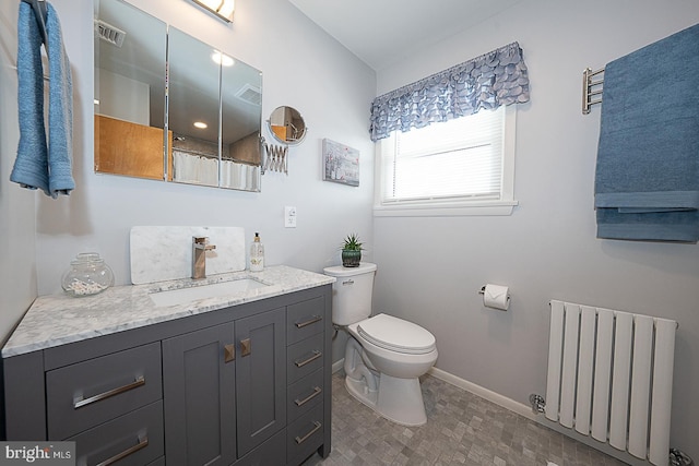 101 Andrea Rd, Cheltenham, PA 19012 - bathroom featuring radiator, vanity, toilet, baseboards, and curtained shower