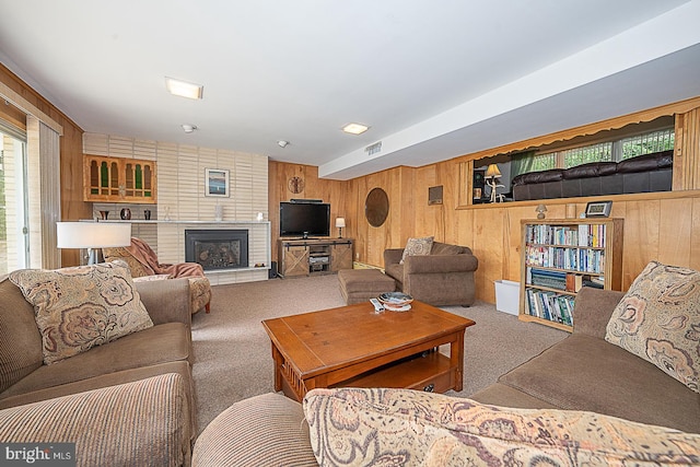 101 Andrea Rd, Cheltenham, PA 19012 - living area with carpet floors, wood walls, and a brick fireplace