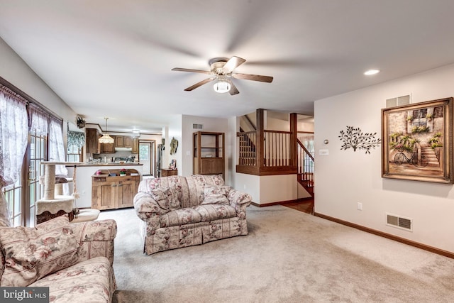2744 Church Ln, Taneytown, MD 21787 - living area with light colored carpet, a ceiling fan, stairs, and recessed lighting