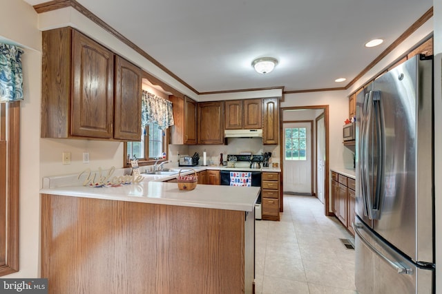 2744 Church Ln, Taneytown, MD 21787 - kitchen with stainless steel appliances, under cabinet range hood, a peninsula, plenty of natural light, and recessed lighting